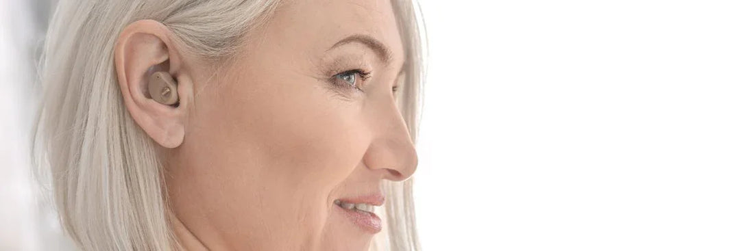 Lady wearing over the counter hearing aid